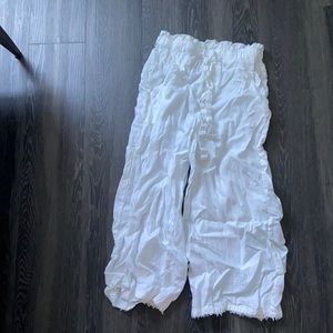 White cloth and stone beach pants